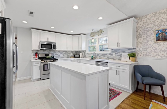 Spacious 5-bedroom house w/ 1.5 Kitchens & Beautiful Yard near Broad Ripple