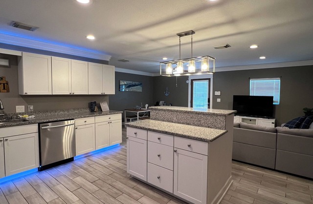 "Spacious 5-Bedroom Home with Versatile Living Areas and Private Pool