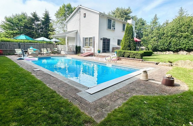Spacious 5-bdrm home- saltwater pool, WiFi, AC, access Westerly town beach