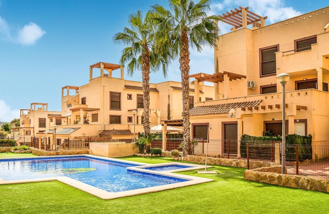 Spacious and practical vacation apartment in a gated community with communal pools.