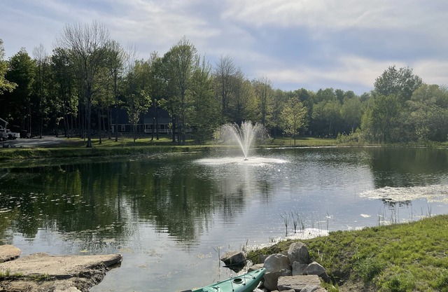 Spacious Cape Style house on 43 acres with pond