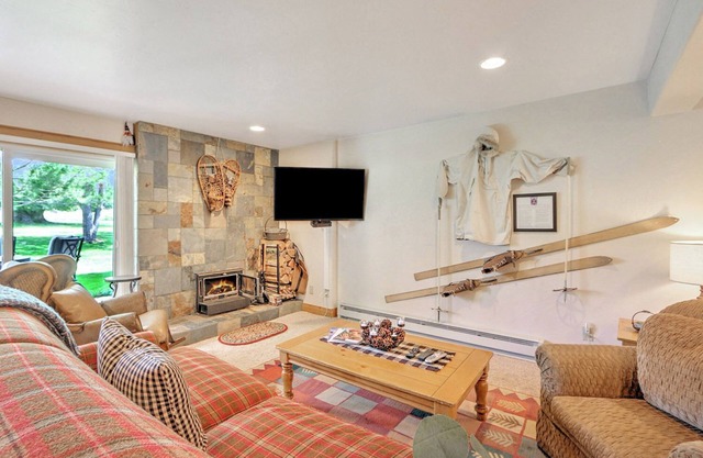 Spacious Condo on Golf Course w/Fireplace, Firepit, Patio and 2 Fishing Badges!