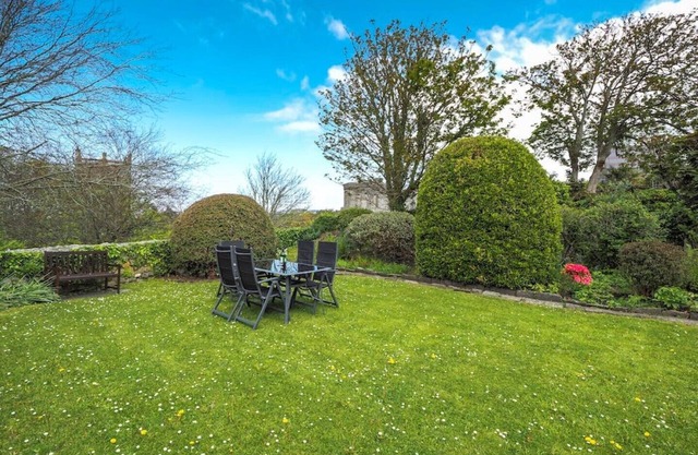 Spacious cottage in the heart of St Davids overlooking cathedral with parking .