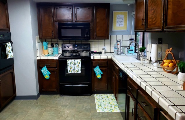 Spacious cozy 4 bedroom 2 bath home in a quiet well established neighborhood
