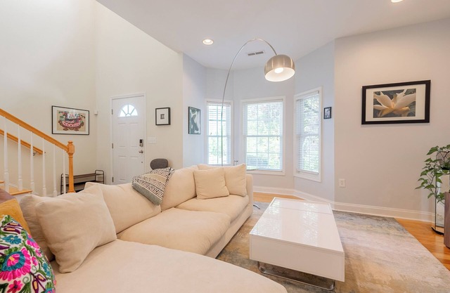 Spacious family home with 3 bedrooms, full kitchen, workspaces & spa-style bath in quiet area.