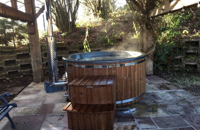 Hauptdekoration MOUNTAIN SPIRIT mit Kamin SAUNA WIFI