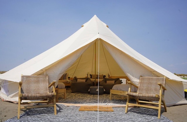 Spacious glamping tent on private sandy beach