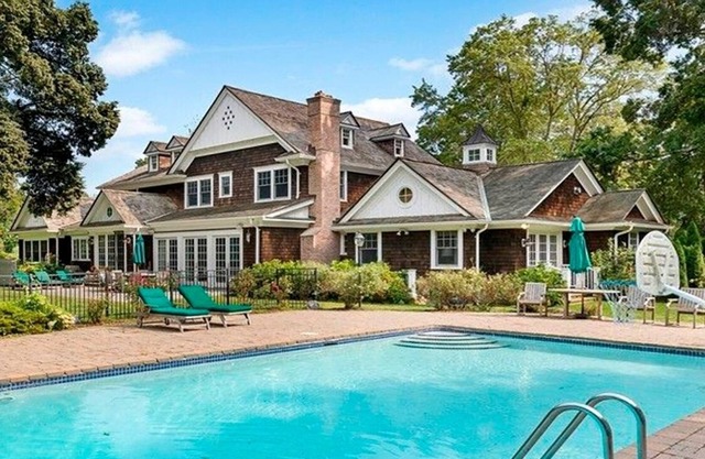 Spacious Hampton style house with giant indoor basketball court.