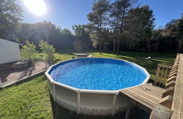 Spacious home with a private pool, hot tub, multiple decks, washer/dryer, & AC