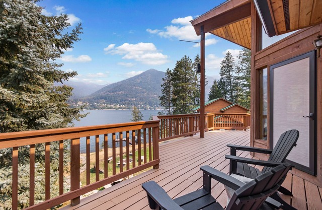 Spacious lakefront home with private hot tub, dock, boat lift, views & game room