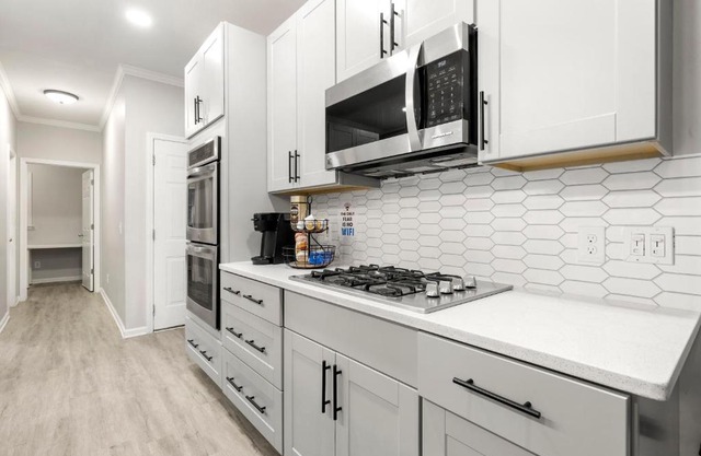 Spacious lovely 5 bedroom home with alot of amenities, prime location, home theater, pet&longstay ok