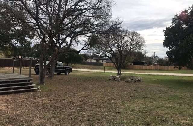Spacious open floor plan with beautiful oak trees.