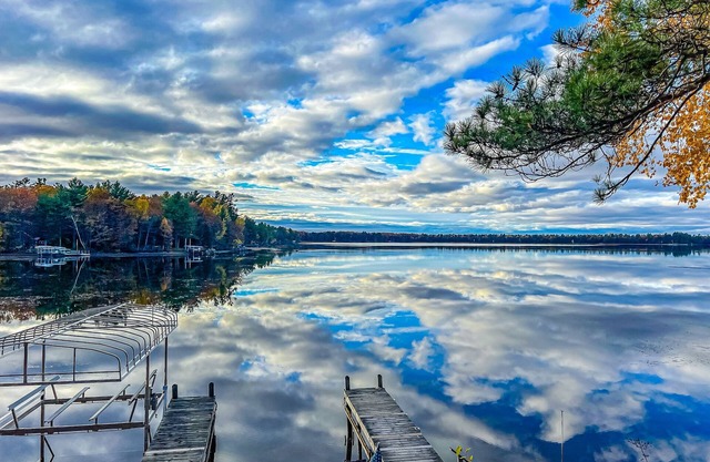 Spacious & peaceful lakefront villa & guest house with fire pit, patio, & views