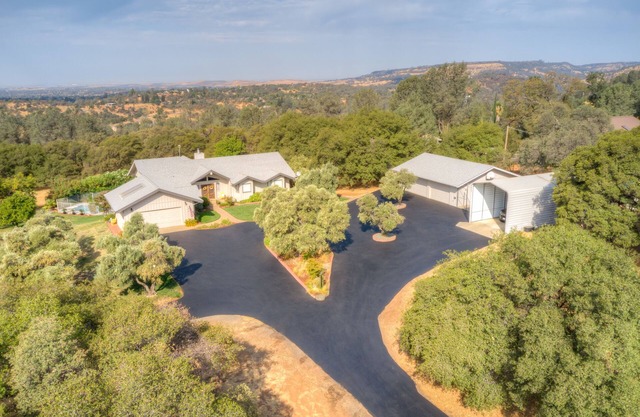 Spacious residential home with pool, bar, and game room.
