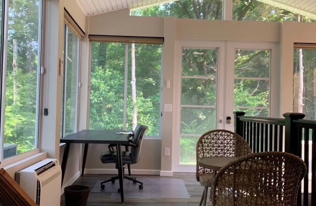 Spacious Split-Level, Basement Apt. w/Gorgeous Sunroom Overlooking Wooded Area.