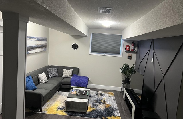Spacious stylish family-friendly two bedroom basement suite for your comfort