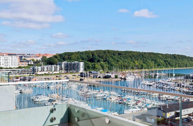 Spacious waterfront apartment with marina views