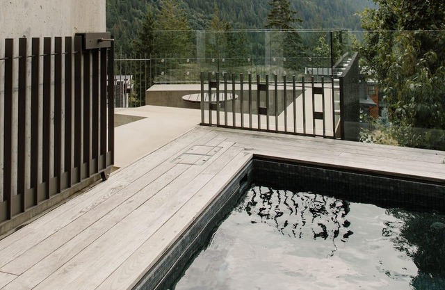 Spectacular architectural home immersed in nature with luxury furnishings.