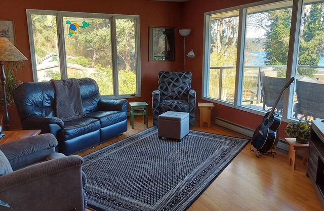 Spectacular beach front property with stunning view of coastal mountains.