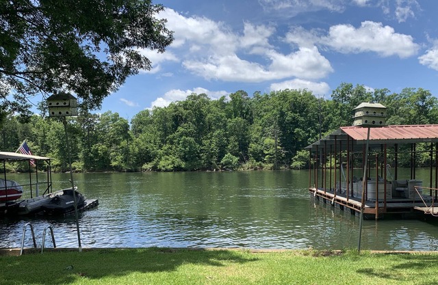 Spectacular lake front home. Private fishing deck and covered boat slip