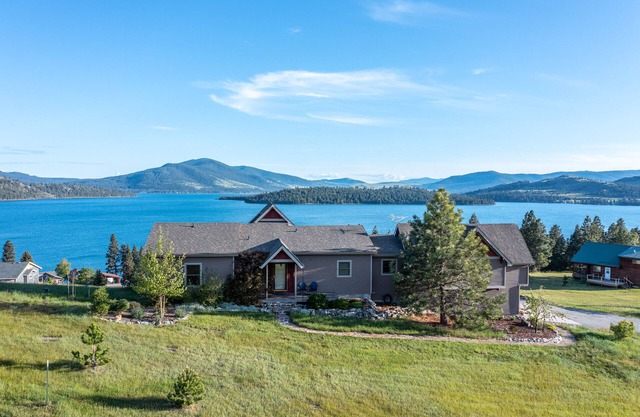 Spectacular lake-view retreat with deck, grill, free WiFi, W/D, & island views