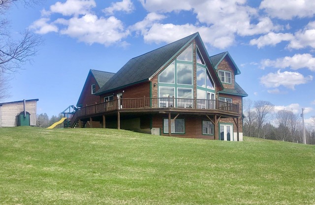 Spectacular Mountain Views from this Chalet Near Ski Resort and Lake