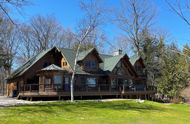 Spend the summer at this pristine house on Grand Traverse Bay!
