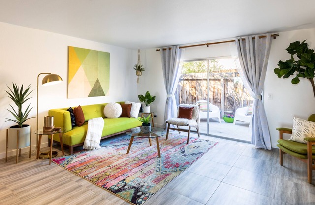 Spin Some Vinyl at a Lush Green Retreat with Two Bedrooms