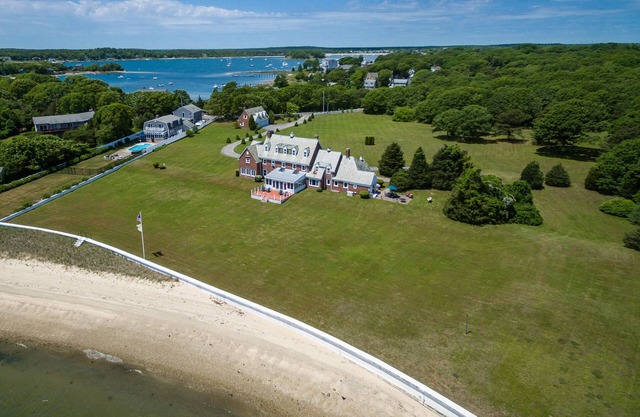 Sprawling Waterfront Classic Estate with Private Sandy Beach