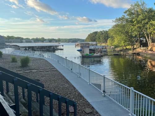 STAIRS OPTIONAL! Lakefront! Pool! On Water! Convenient Fishing!