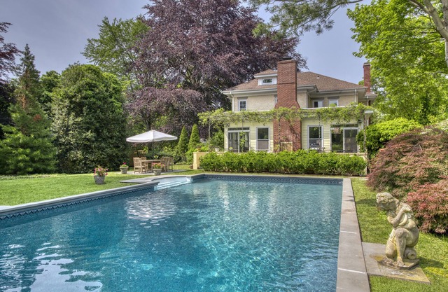 STATELY, PEACEFUL & TASTEFUL WITH SPARKLING POOL AND FIREPLACES