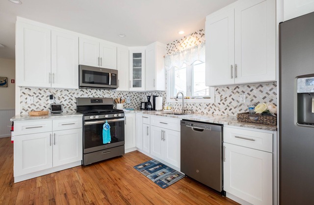 Steps from the beach with water views!