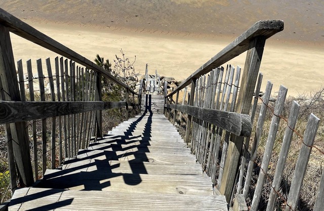 Steps to private bay beach (0.2 mi). Central AC.
