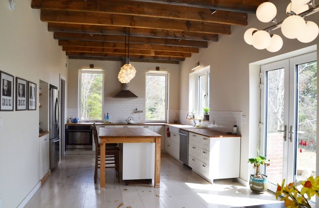 Stone Eco House on 120 acres with a pond, meadows, brook, and hiking trails.