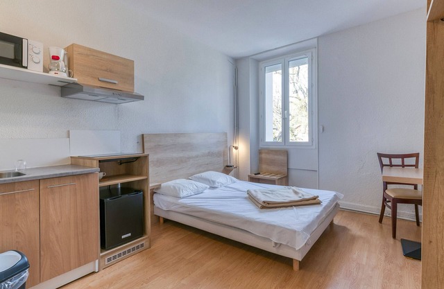Studio '210' mit Gemeinschaftspool, gemeinsamer Terrasse und Wi-Fi