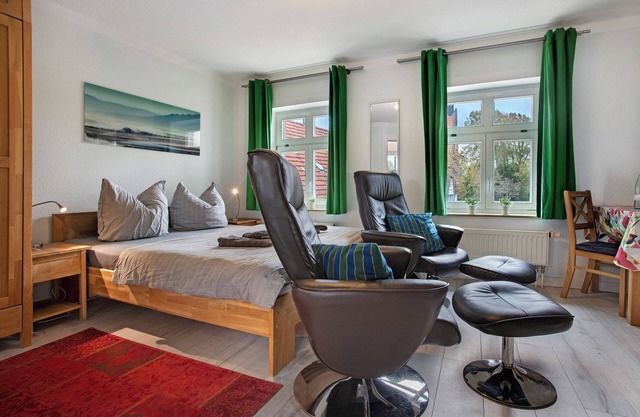 Einzimmerapartment 'Bäckerhus - Ferienwohnung 3' mit Gemeinschaftsterrasse und Garten