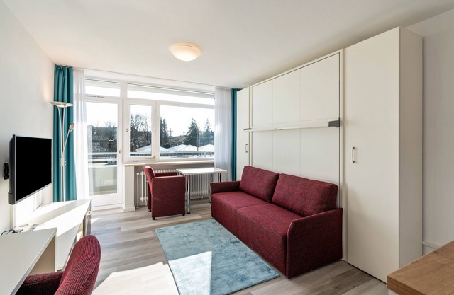 Einzimmerapartment "Huber Living Basic 105" mit Balkon und WLAN