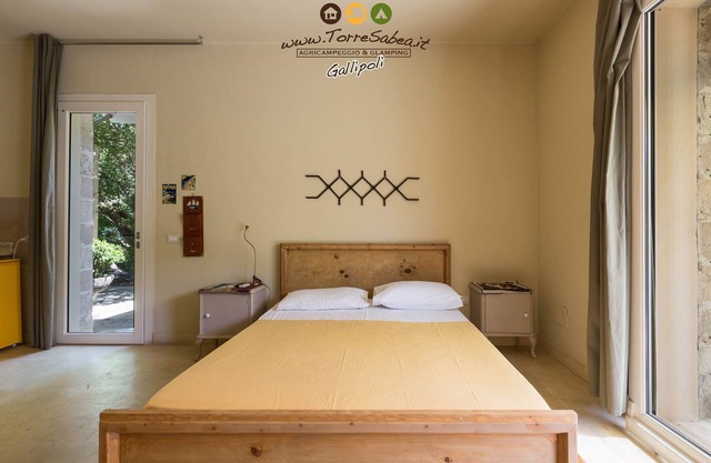 Studio-Apartment mit Küchenzeile, Terrasse und privatem Parkplatz