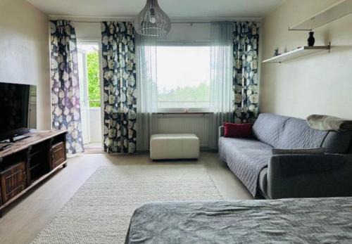 Studio with glazed balcony