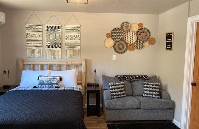 Studio with Private Hot Tub, Shared Pool, and Walk To Town