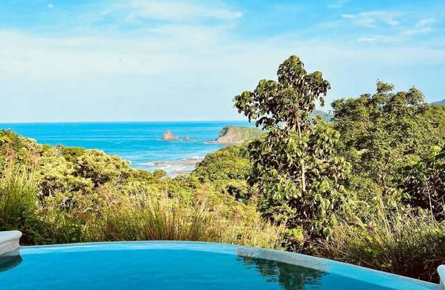 Stunning 2-bedroom bungalow with a million dollar ocean view and infinity pool