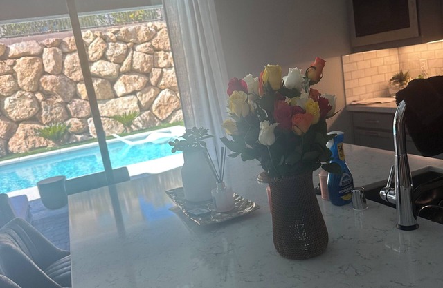 Stunning 4-bedroom house in Gated Summerlin with pool, hot tub, fitness room.