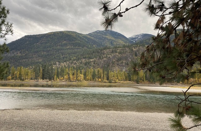 Stunning 9.3 acres riverfront w electric- near Quinn’s Hotsprings!