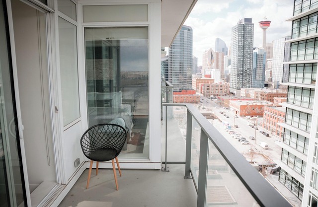 Stunning Corner Suite with Breathtaking Views of the Saddledome and Skyline