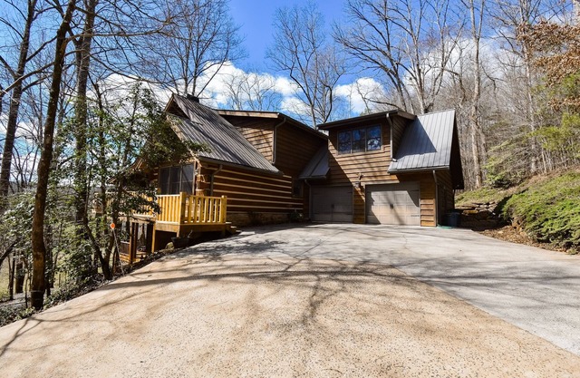 Stunning creek-view home with private hot tub, game room, firepit