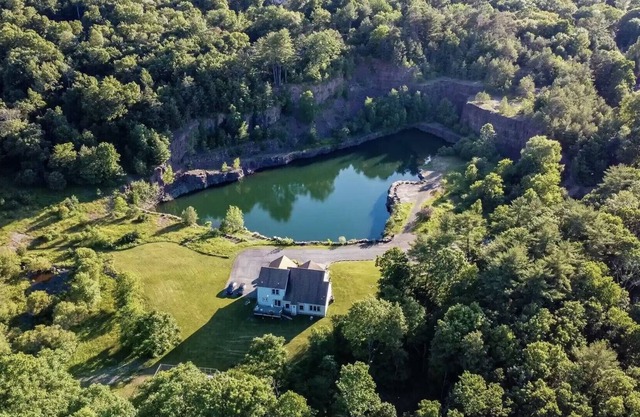 Luxury home on a 2+ acre crystal clear private Lake&beach near all attractions.