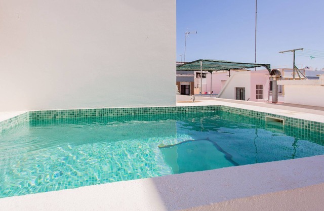 Stunning House With Rooftop and Pool by LovelyStay