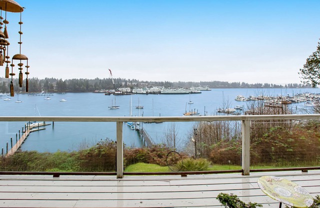Stunning island home with water views, 2 kitchens, game room & wine cellar