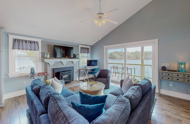 Stunning lakefront home with kayaks, games, & amazing deck views - dog-friendly