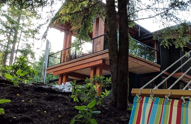 Stunning oceanfront oasis with majestic mountain and lush forest views.